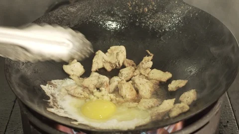 Cooking egg and chicken Stock Footage 88571293