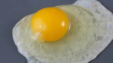 Cooking an egg Stock Footage 22122362