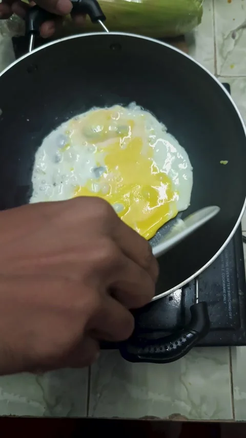 Cooking Egg in Frying Pan Stock Footage 313149436
