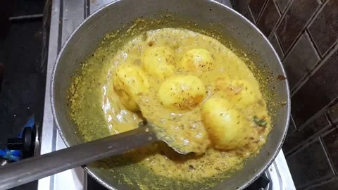 Cooking egg in mustard sauce Stock Footage 154422100