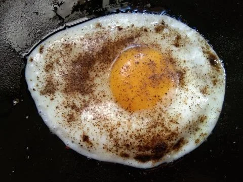 Cooking egg Stock Photos