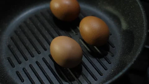 Cooking Eggs Perfectly Using a Griddle Pan for Breakfast Dishes Stock Footage 315916696