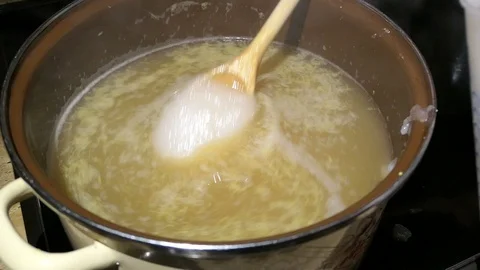 Cooking elder beery flower head jam confiture in a pot. filling sugar into. 動画素材 122588488