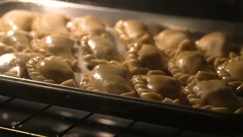 Cooking empanadas in the oven (Timelapse) Stock Footage 205966738