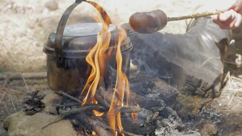 Cooking on fire Stock Footage 88719768