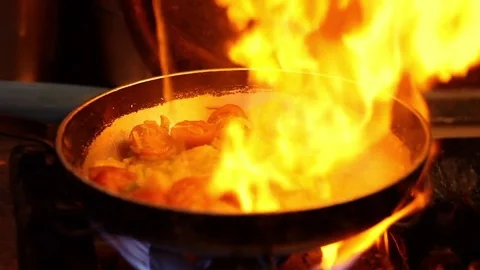 Cooking fire in pan Stock Footage 75007640