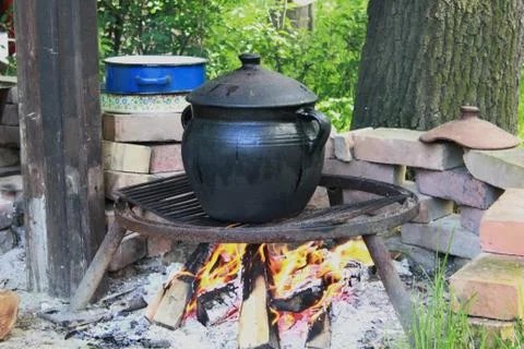 Cooking on fire Stock Photos