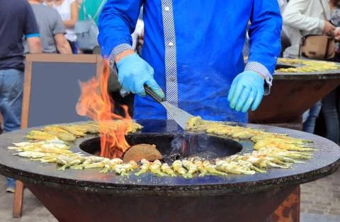 Cooking on fire Stock Photos