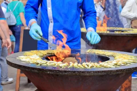 Cooking on fire Stock Photos