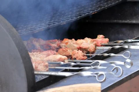 Cooking on fire Stock Photos
