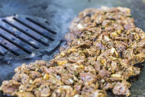 Cooking on the fire plate Foto stock