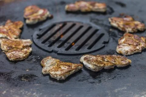 Cooking on the fire plate Stock Photos