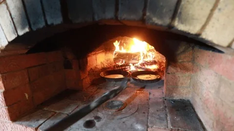 Cooking in the fireplace Stock Footage 113391727
