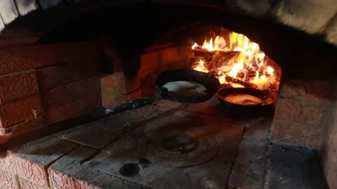 Cooking in the fireplace Stock Footage 113391761