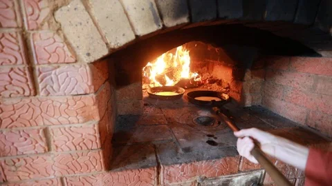 Cooking in the fireplace Stock Footage 113392010