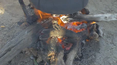 Cooking on firewood Stock Footage 62451177