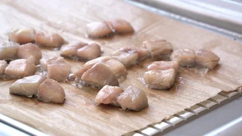 Cooking fish on baking paper Stock Footage 75864798