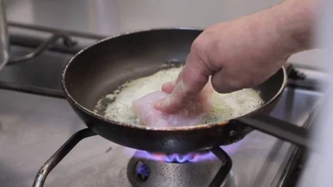 Cooking fish Stock Footage 74247461