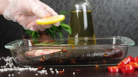 Cooking fish. Stock Footage 169128947