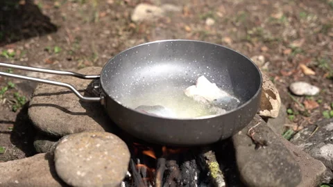 Cooking Fish in Frying Pan on Fire 動画素材 317895845