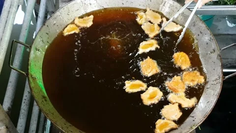 Cooking fish-paste balls in market Stock Footage 227119967