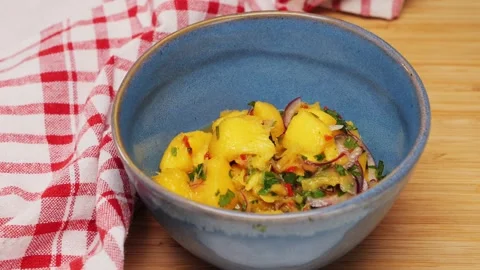 Cooking fish Peruvian ceviche close-up. Fresh cooked ceviche made of raw white Stock Footage 289668352