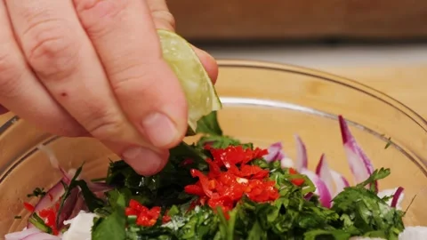 Cooking fish Peruvian ceviche close-up. Fresh cooked ceviche made of raw white Stock Footage 290230652