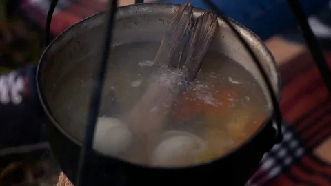 Cooking fish soup in the kettle Video stock 82213734