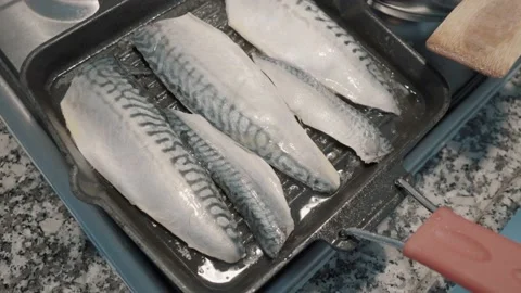 Cooking fish on the stove Stock Footage 171164948