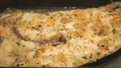 Cooking fish trout in oven Stock Footage 76852059