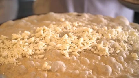 Cooking Flatbread with Cheese Stock Footage 319951054