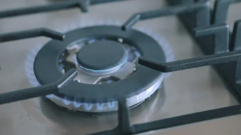 Cooking food on the gas stove. Switching... | Stock Video | Pond5