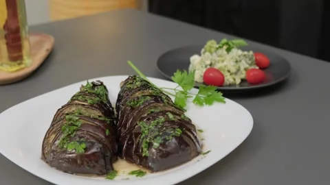 Cooking Food Plating on Dark Surface with Herbs and Tomatoes Video stock 341430901