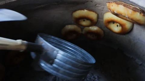 Cooking fresh bread in a traditional oven Stock Footage 103624414