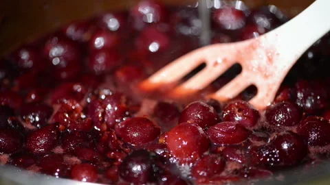 Cooking fresh cherry fruit jam in a pot. 스톡 동영상 132440754