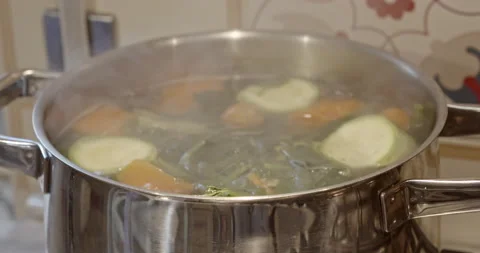 Cooking fresh vegetables into a boiling pot- 4k extreme slow motion - close Stock Footage 151642201