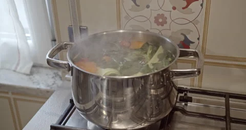 Cooking fresh vegetables into a boiling pot- 4k slow motion Stock Footage 151644501