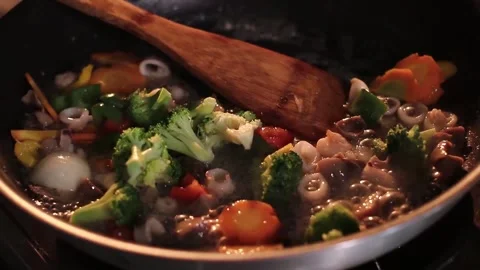 Cooking fresh vegetables on the pan Stock Footage 167754853