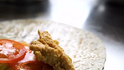 Cooking fried breaded chicken. Close up of Frying chicken nuggets in the fryer Stock Footage 107674855