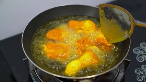 Cooking Fried Chicken Stock Footage 77198402