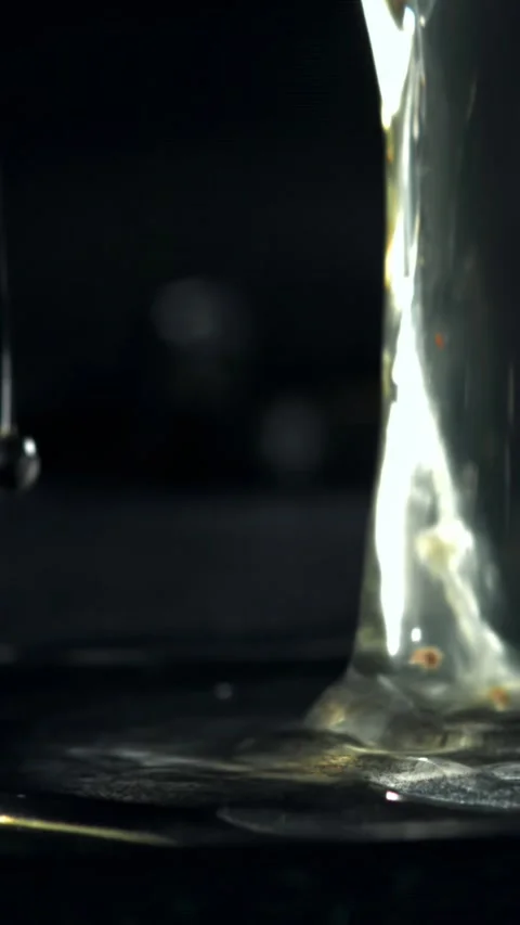 Cooking a fried egg. Filmed on a high-speed camera at 1000 fps Stock Footage 335370434