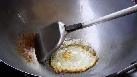 Cooking fried egg Stock Footage 301619643