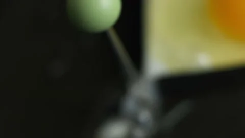 Cooking fried egg in the shape of heart in a frying pan. Cooking a surprise Stock Footage 150499319