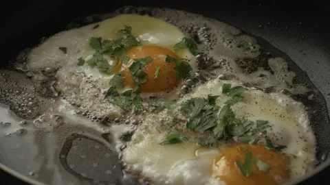 Cooking Fried eggs. Process of Preparation of Two Fried Egg. Full Cycle of Stock-Footage 113453477