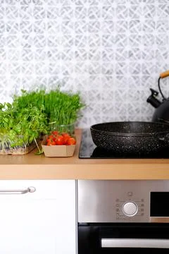 Cooking fried eggs with vegetables for breakfast or snack Stock Photos