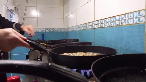 Cooking fried perch in the pan. Frying freshwater fish in oil Stock Footage 83344688