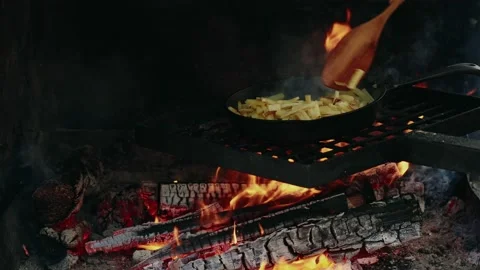 Cooking Fried Potatoes On A Campfire Video stock 238603129