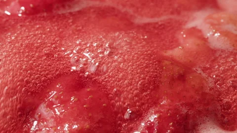 Cooking fruits Jam, Process of making homemade strawberry jam. Red sweet syrup 스톡 동영상 243137271
