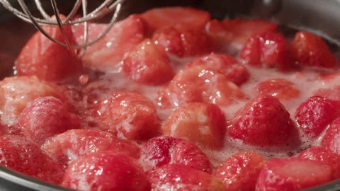 Cooking fruits Jam, Process of making homemade strawberry jam. Red sweet syrup Stock Footage 243137313