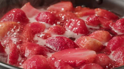 Cooking fruits Jam, Process of making homemade strawberry jam. Red sweet syrup Stock Footage 243137348